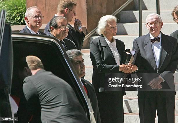 Supreme Justices, Anthony Kennedy, Anthony Scalia, Sandra Day O'Connor, and John Paul Stevens wait as the Coffin is prepared for the pallbearers at...