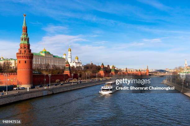 city view over the kremlin palace and moskva river at sunset time in moscow,russia. - moscva river stock-fotos und bilder