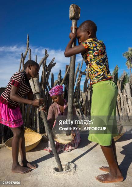 African women with mortars and pestles, ondangwa, Namibia on March 2, 2014 in Ondangwa, Namibia.