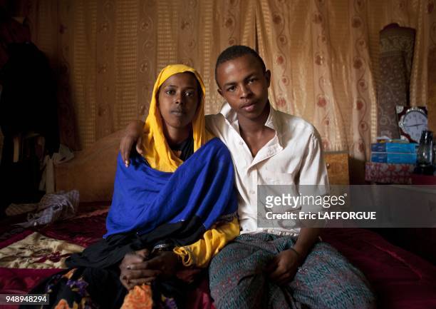 Young Mixt Couple In Bedroom Holding Each Other Tight Hargeisa Somaliland.