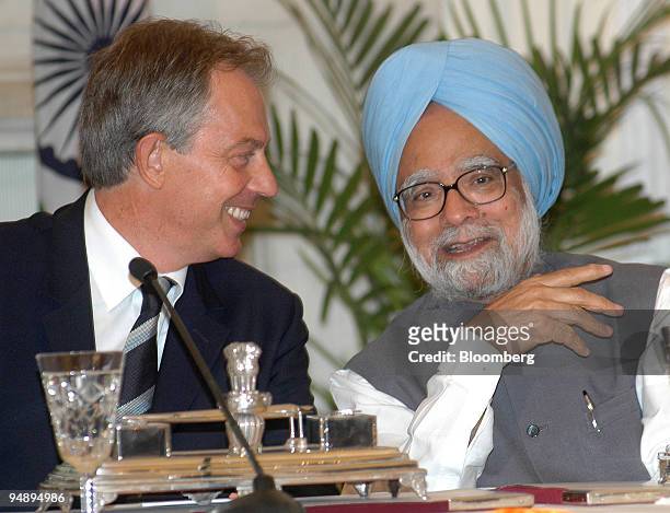 British Prime Minister Tony Blair, left, and Indian Prime Minister Manmohan Singh together at a joint press conference in New Delhi, India, Wednesday...