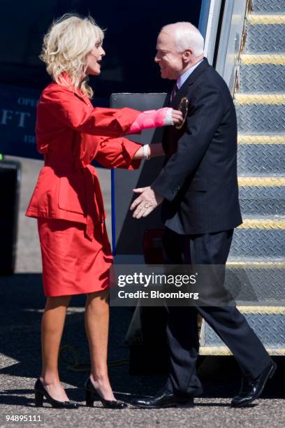 Senator John McCain of Arizona, Republican presidential candidate, right, greet his wife Cindy upon his arrival in Minneapolis, Minnesota, U.S., on...