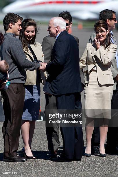 Senator John McCain of Arizona, Republican presidential candidate, center, greets Levi Johnston, boyfriend of Bristol Palin, who is the daughter of...