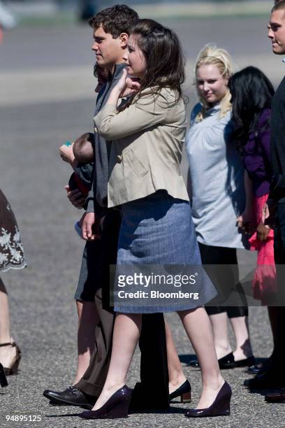 Bristol Palin, center, daughter of Sarah Palin, governor of Alaska and John McCain's vice presidential running mate, walks with her boyfrind Levi...