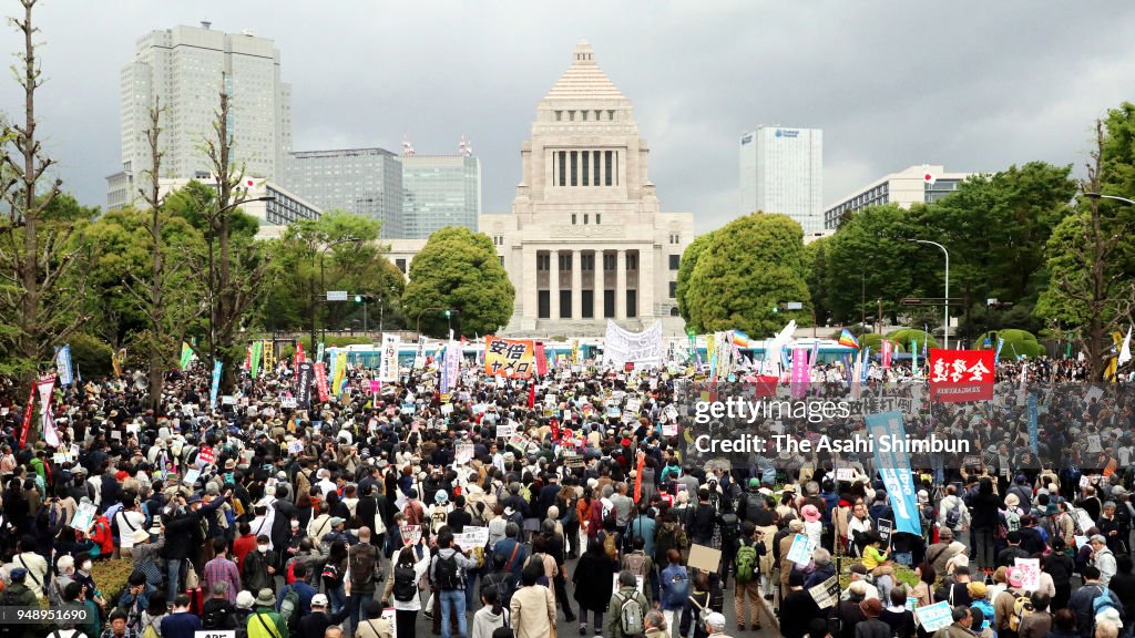 Thousands Rally Across Japan To protest Abe Administration
