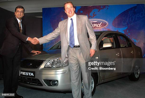 Ford Motor Co. Chairman William Ford poses with Arvind Mathew, managing director and president of Ford India, during a press conference in New Delhi,...