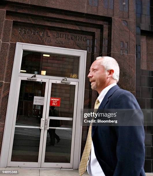 Giles Darby, former investment banker for the Royal Bank of Scotland, arrives at the federal courthouse in Houston, Texas, U.S., for a sentencing...