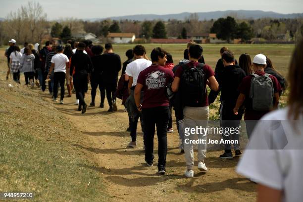 Students from Marjory Stoneman Douglas High School, Pittsburgh, Columbine as well as survivors from Arapahoe and Aurora walk from the Columbine...