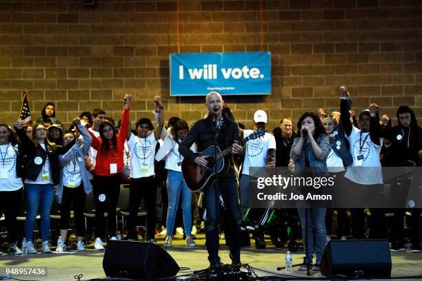 Issac Slade of the Fray with his wife, Anna perform "How to Save a Life" with students from Marjory Stoneman Douglas High School, Pittsburgh,...