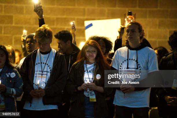 Candle bearers honor the 13 students that lost their lives at Columbine with students from Marjory Stoneman Douglas High School, Pittsburgh,...