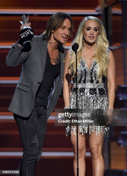 Keith Urban and Carrie Underwood accept the Vocal Event of the Year award for "The Fighter" during the 53rd Academy of Country Music Awards at MGM...