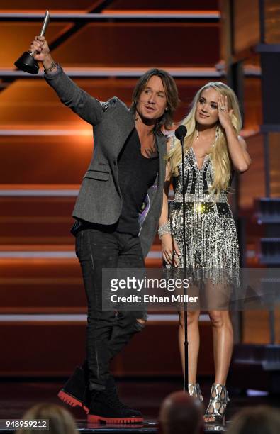 Keith Urban and Carrie Underwood accept the Vocal Event of the Year award for "The Fighter" during the 53rd Academy of Country Music Awards at MGM...