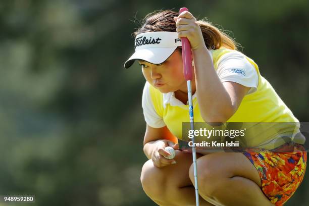 Hiromi Kamata of Japan lines up for her putt on the 17 hole during the final round of the Panasonic Open Ladies at Tanabe Country Club on April 20,...