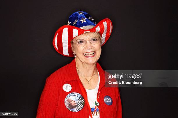 Lynn Cottrel, a delegate from Aurora, Colorado, stands for a portrait on day two of the Republican National Convention at the Xcel Energy Center in...