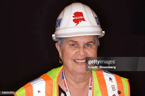 June Burkhart, a delegate from Alaska who is wearing a helmet in support of drilling in the Arctic National Wildlife Refuge , stands for a portrait...