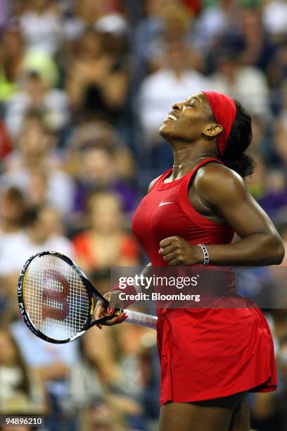 Serena Williams of the U.S. Celebrates her defeat of Severine Bremond of France during their singles tennis match on day eight of the U.S. Open in...