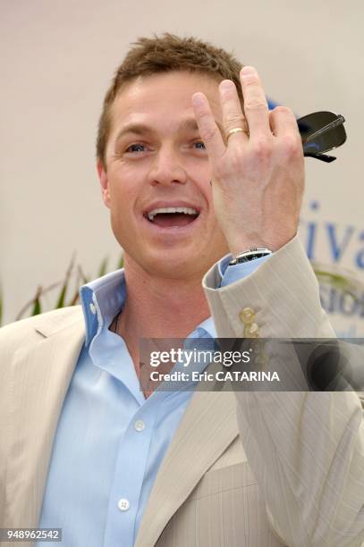 Eric Close poses for the picture with TV presenter Rachel Bourlier, one of his fans.