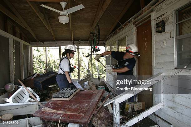 Firefighters from Beverly, Mass. Conduct search and rescue operations in Waveland, Miss. September 2, 2005 in the aftermath of Hurricane Katrina.