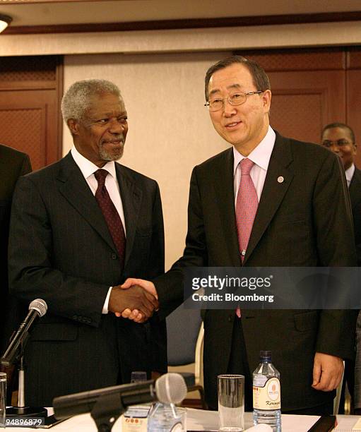 Ban Ki-Moon, the United Nations Secretary-General, right, shakes hands with Kofi Annan, the former United Nations chief in Nairobi, Kenya, on Friday,...