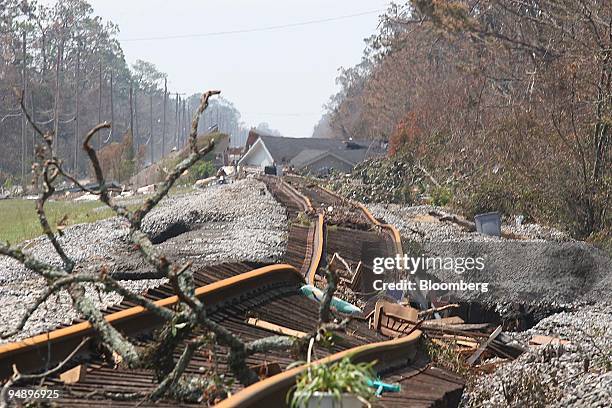 Twisted railroad tracks lie damaged by Hurricane Katrina in Waveland, MS. Friday, September 2, 2005.