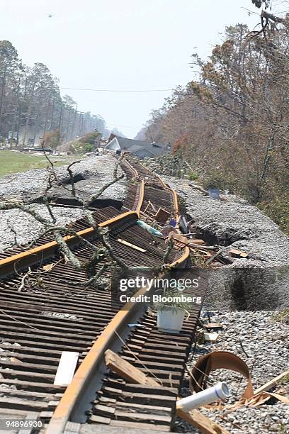 Twisted railroad tracks lie damaged by Hurricane Katrina in Waveland, MS. Friday, September 2, 2005.