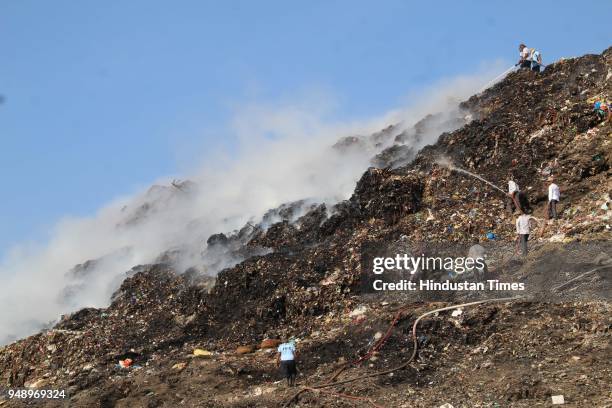 Major fire broke out on all sides of the Adharwadi dumping ground at 4 pm, releasing thick smoke into the entire Kalyan region, on April 19, 2018 in...