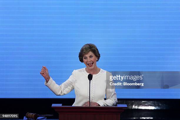 First Lady Laura Bush, wife of U.S. President George W. Bush, waves to the audience before speaking on day one of the Republican National Convention...