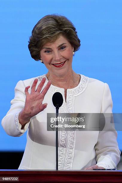 First Lady Laura Bush, wife of U.S. President George W. Bush, waves to the audience before speaking on day one of the Republican National Convention...