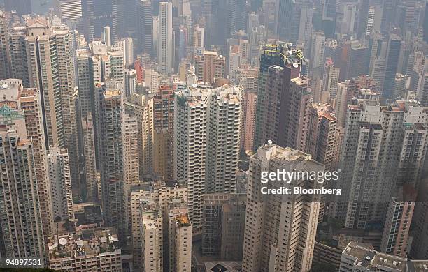 Residential apartment towers stand in Hong Kong, China, on Tuesday, Feb. 19, 2008. Hang Lung Properties Ltd., Hong Kong's fourth-largest developer by...