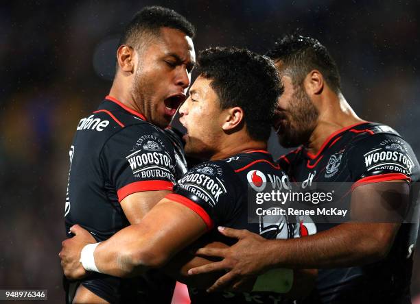 Mason Lino of the Warriors celebrates his try with David Fusitu'a during the round seven NRL match between the New Zealand Warriors and the St George...