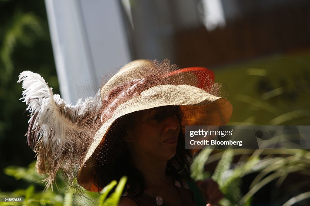 A woman walks into the VIP tent during the Hampton Classic H