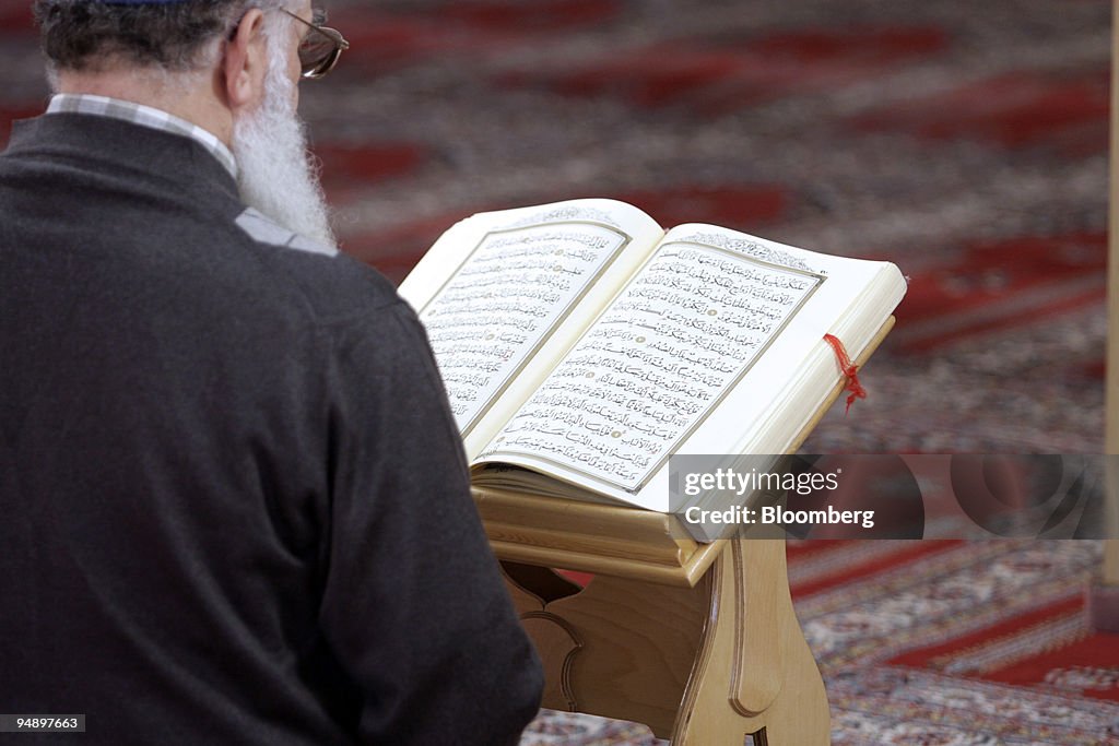 A Muslim reads the Koran inside the mosque of the Turkish-Is