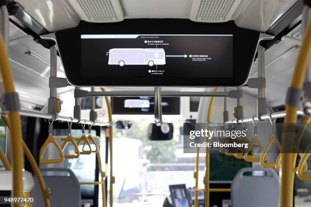 Monitor is displayed onboard a Toyota Motor Corp. Sora fuel-cell bus during a test-drive event in Tokyo, Japan, on Friday, April 20, 2018. Toyota...