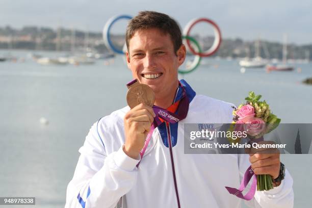 Jonathan Lobert of France celebrates finishing third in the Men's Finn Sailing on Day 9 of the London 2012 Olympic Games at the Weymouth & Portland...