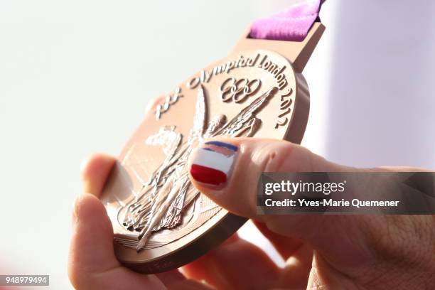 Jonathan Lobert of France celebrates finishing third in the Men's Finn Sailing on Day 9 of the London 2012 Olympic Games at the Weymouth & Portland...