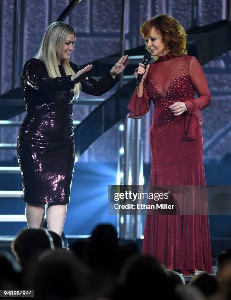 Kelly Clarkson and Reba McEntire perform during the 53rd Academy of Country Music Awards at MGM Grand Garden Arena on April 15, 2018 in Las Vegas,...