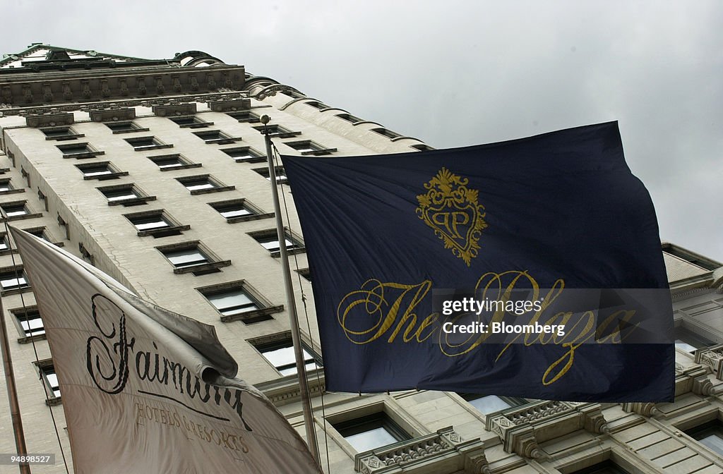 Flags wave in front of the Plaza Hotel in New York on Friday