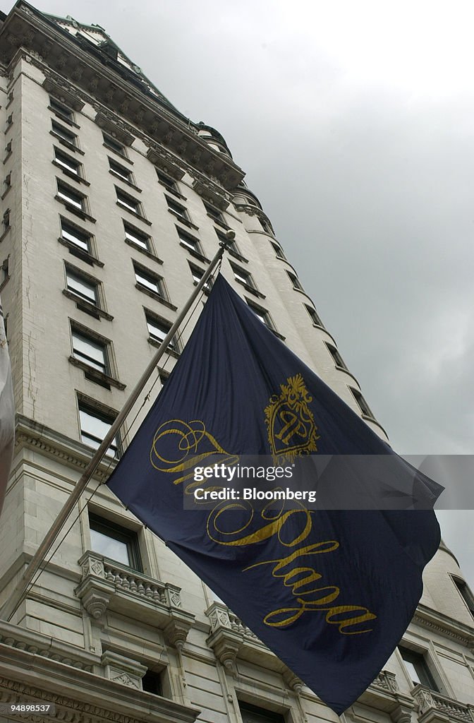 Flags wave in front of the Plaza Hotel in New York on Friday