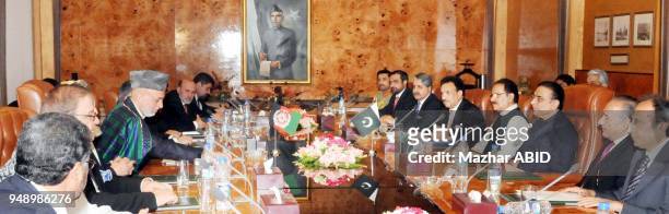 President Asif Ali Zardari and his Afghan counterpart, Hamid Karzai lead their respective Delegations during bilateral talks at Aiwan-e-Sadr in...
