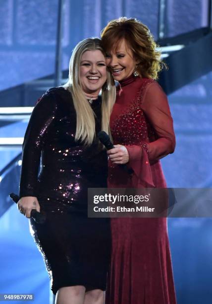 Kelly Clarkson and Reba McEntire perform during the 53rd Academy of Country Music Awards at MGM Grand Garden Arena on April 15, 2018 in Las Vegas,...