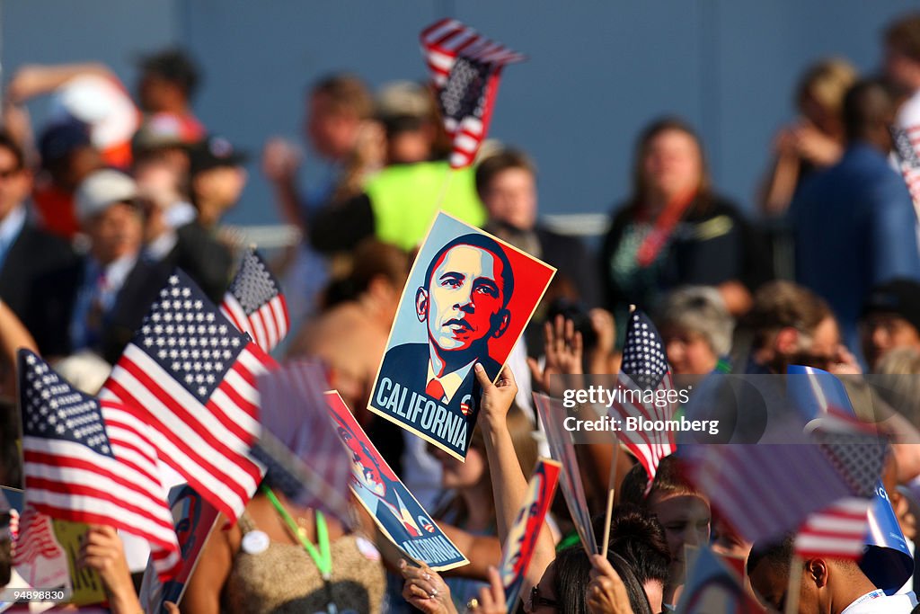 Delegates wave flags and posters on day four of the Democrat