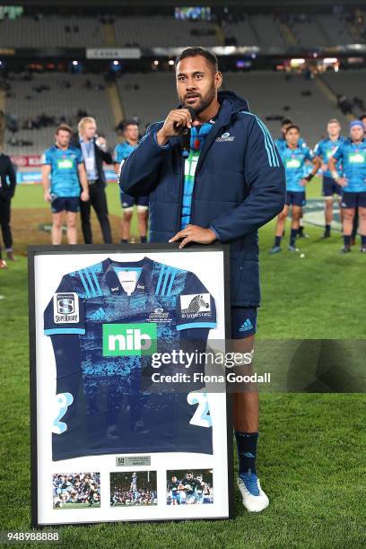 Patrick Tuipulotu of the Blues celebrates his 50th game with during the round 10 Super Rugby match between the Blues and the Highlanders at Eden Park...