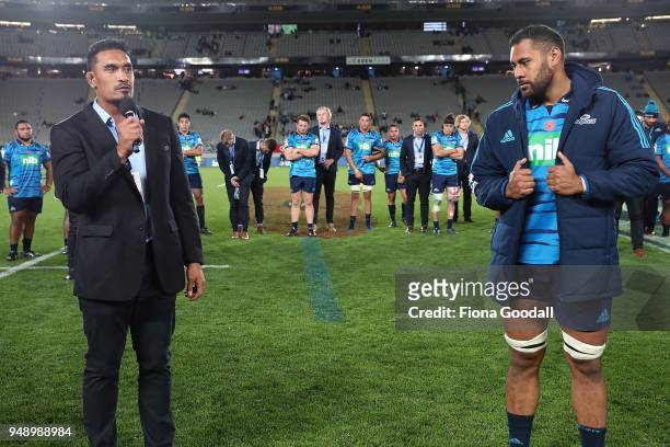 Patrick Tuipulotu of the Blues celebrates his 50th game in a presentation with Jerome Kaino of the Blues during the round 10 Super Rugby match...