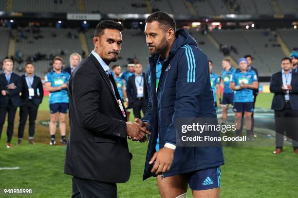 Patrick Tuipulotu of the Blues celebrates his 50th game in a presentation with Jerome Kaino of the Blues during the round 10 Super Rugby match...