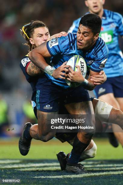 Rieko Ioane of the Blues is tackled during the round 10 Super Rugby match between the Blues and the Highlanders at Eden Park on April 20, 2018 in...