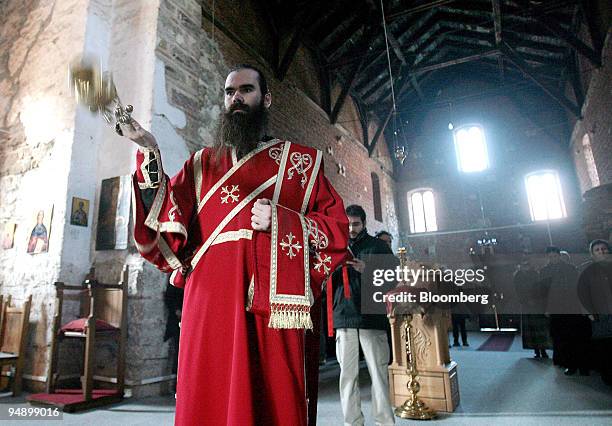 Kosovo Serb priest leads the prayers at the monastery in Banjska to celebrate Serbia's national day, "Sretenje" near Mitrovica, Kosovo, on Friday,...