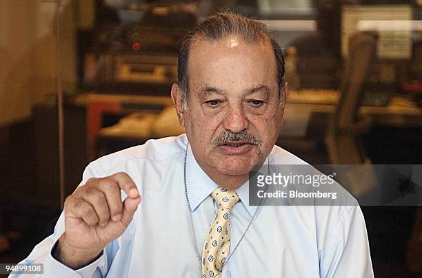 Billionaire Carlos Slim Helu, whose companies include Mexico City-based Telefonos de Mexico SA and America Movil SA DE CV, smiles during a luncheon...