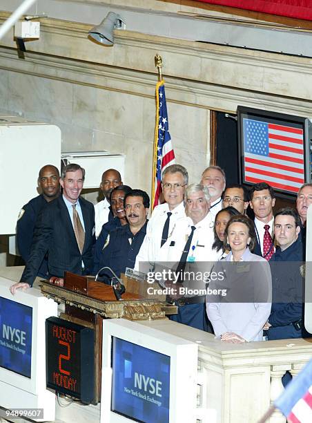 The New York Stock Exchange welcomes members of the New York Stock Exchange Security Division to the Closing Bell, Friday, August 2, 2004. Source:...