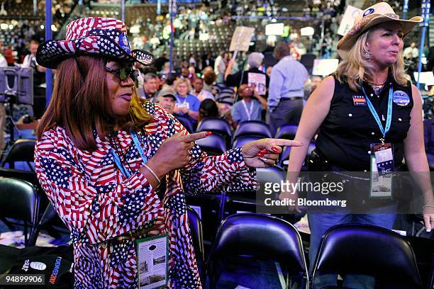 Julia Hicks, a delegate from Colorado, Ann Zucker, dances during day one of the 2008 Democratic National Convention in Denver, Colorado, U.S., on...