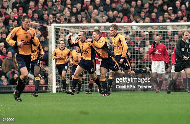 Liverpool celebrate Danny Murphy's goal during the FA Carling Premiership match against Manchester United at Old Trafford in Manchester, England....